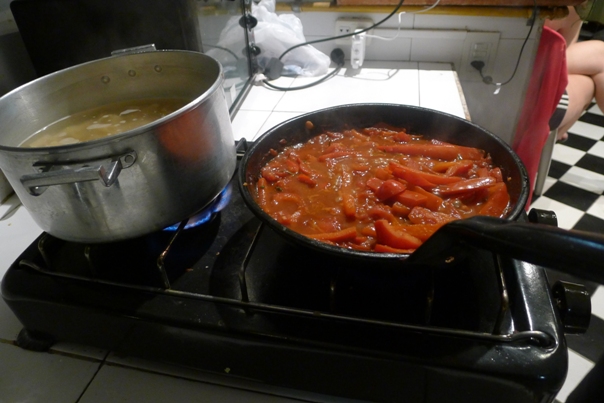 Whipping up some nutritious and delicious homemade pasta in our hostel